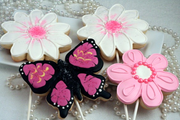 Butterfly and flower decorated sugar cookies