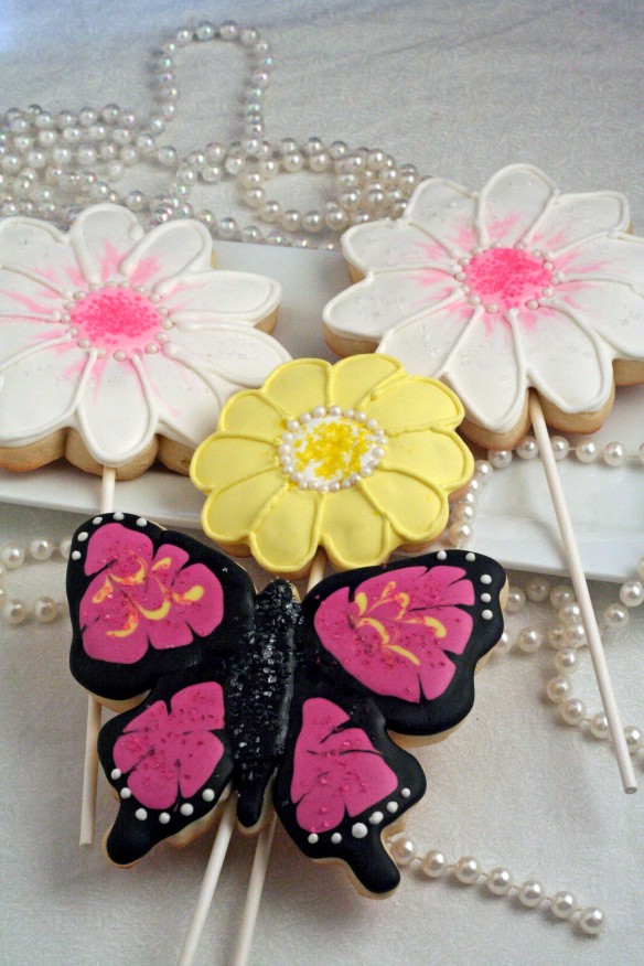 Decorated flower and butterfly sugar cookies
